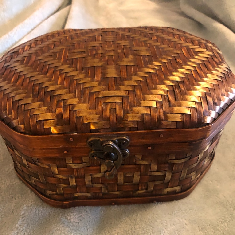 Antique woven basket with closure
